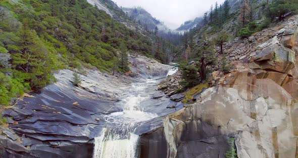 Rugged River Falls Along Granite Rock Formation.