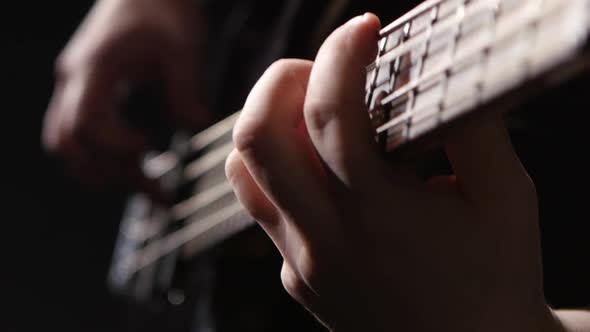 Close Shot of the Strings on a Guitar