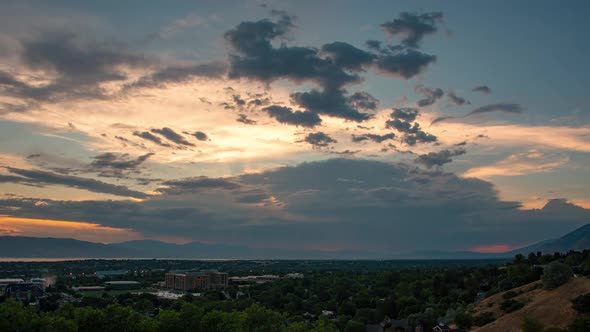 Time lapse of clouds moving across the sky over Provo City