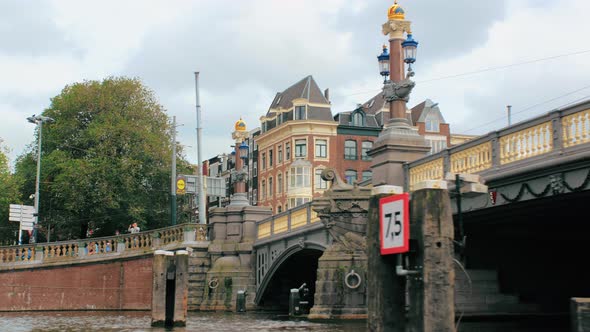 Amsterdam, Netherlands - September 2019: Luxurious Medieval Bridge in the Center of the Capital