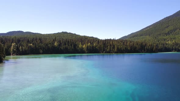 Aerial view of beautiful lake and mountains 4k