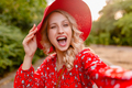 attractive stylish blond smiling woman in straw red hat and blouse summer fashion - PhotoDune Item for Sale