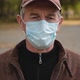 Close Up Portrait of Senior Man Wearing Protective Medical Face Mask - VideoHive Item for Sale