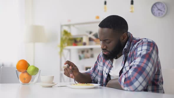 African-American Man Having No Appetite, Eating Disorder, Depression Problem