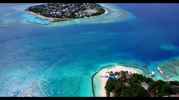 Aerial drone view landscape of perfect resort beach trip by blue ocean with white sand background of
