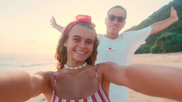 Selfie View Cheerful Young Caucasian Man and Woman Make Video Call on Sea Beach