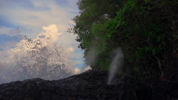 Super Slowmotion Shot of the Fountains or Geysers Made By Nature on Volcanic Rocks Near the White