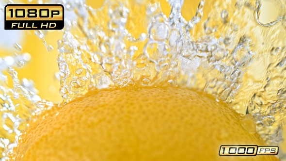 Spinning Lemon Splashed by Water