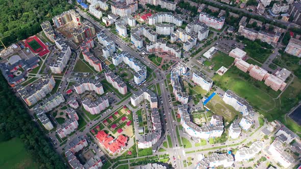 Buildings blocks from the high. Aerial top down view of new estate with neighborhood faculties