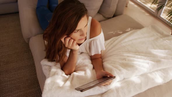 Caucasian woman using a digital tablet