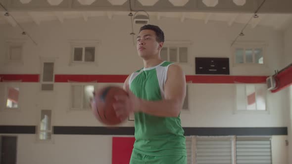 Basketball Player Taking a Shot for Field Goal