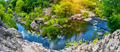 Blue river at bottom of canyon with green trees on bank - PhotoDune Item for Sale