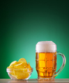 Mug of light beer with foam and chips - PhotoDune Item for Sale