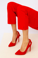 Fashion unrecognizable Lady legs in red pants and shoes.  Minimalist elegant details style. - PhotoDune Item for Sale