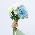 Female hand holding bouquet spring flowers. Minimalist fashion decor concept - PhotoDune Item for Sale