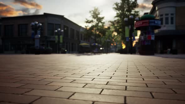 Empty Tiled Floor and Urban Skyline