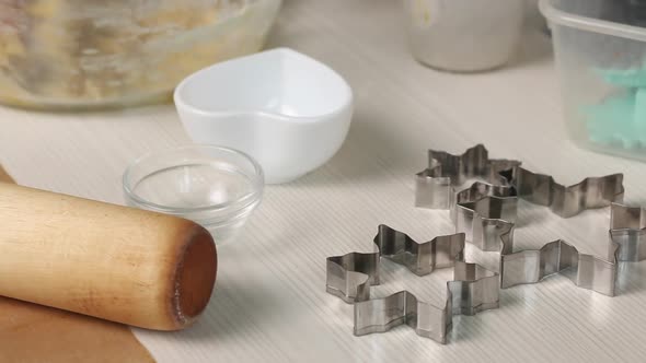 A Woman Is Stirring The Dough For Making Biscuit Cookies.