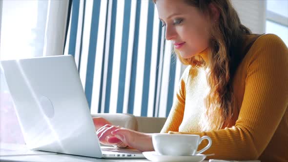 On a Sunny Day, Portrait Close Up of Happy Pretty Young Woman, Girl Sitting in a Cafe Working 