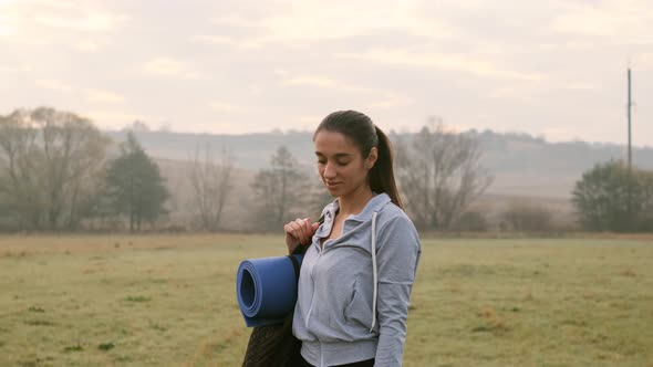 Girl Goes To Gymnastics In Nature.