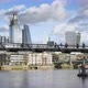 T/L WS People crossing Millennium Bridge, downtown skyscrapers in background / City of London, Londo - VideoHive Item for Sale