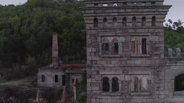 Drone aerial panorama of Termas Radium Hotel Serra da Pena at sunset in Sortelha, Portugal