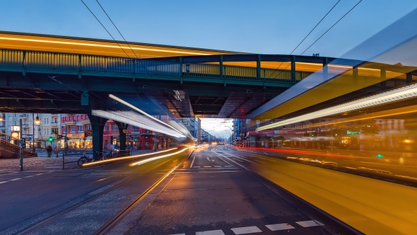 Night to Day Time Lapse of Eberswalder Strasse with subway trams and cars Berlin, Germany