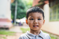 Close up portrait of asian boy smiling in the park. - PhotoDune Item for Sale