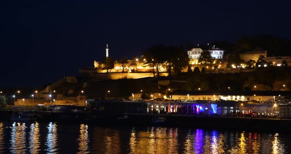 Night Timelapse of Belgrade Fortress Kalemegdan with Light Reflections on Sava River