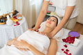 Young beautiful woman with healthy massage of body in the spa salon. Beauty concept. - PhotoDune Item for Sale