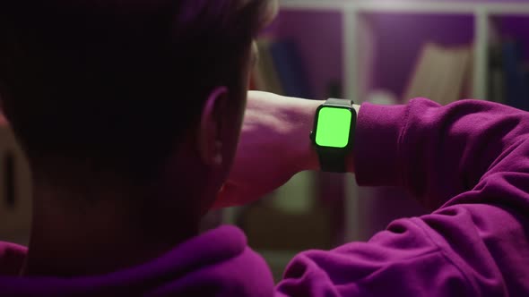 Man Using Smartwatch with Chroma Key Closeup