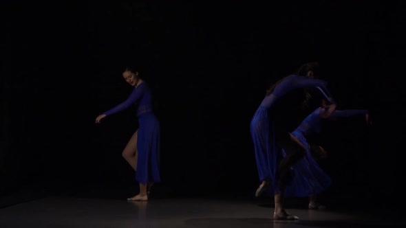 Slow Motion of Three Delightful Ballerinas Dancing Elements of Ballet