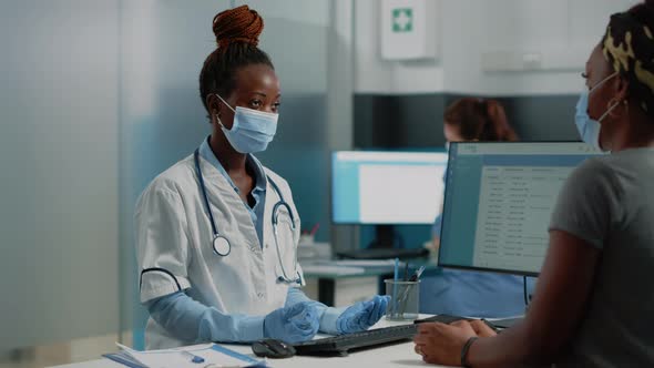 Medic Doing Medical Consultation with Patient for Healthcare