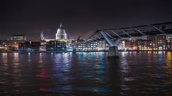 Panoramic view of St Paul's Cathedral and Millennium Bridge at night, London, England.