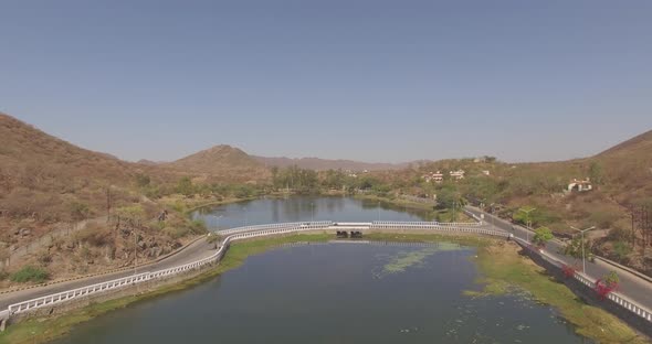 An aerial view of the Rani Road bridge on the periphery of Fateh Sagar Lake in Udaipur Rajasthan Ind