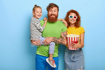 s with bucket of popcorn, spend day off in cinema, watch funny cartoon in 3d glasses, enjoy modern innovative technology. Family time concept