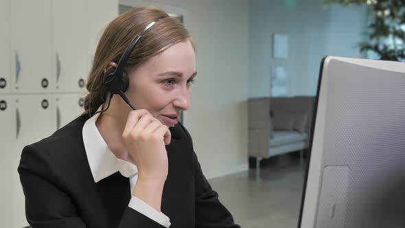 Girl Answers Calls in a Call Center