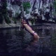 Cute Asian Girl in Bikini Chilling By a Rope in the River Thailand - VideoHive Item for Sale