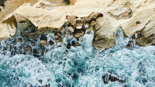 Pure Blue Ocean Water Waves with Light Reflections Crush Mountain at Slow Motion Powerful Storm on