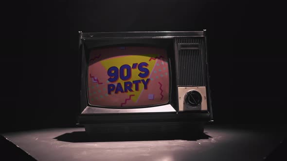 Animation of a 90's Party on the Small Vintage TV Against Black Background. The Light Pouring From