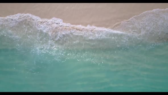 Aerial drone shot travel of paradise bay beach voyage by blue green sea and white sand background of