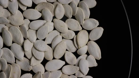 Cinematic, rotating shot of pumpking seeds - PUMPKIN SEEDS 003