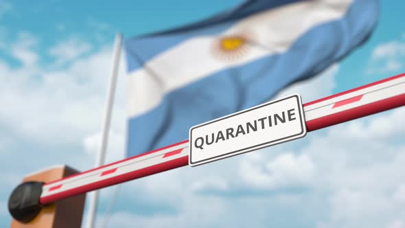 Open Boom Gate with QUARANTINE Sign at the Flag of Argentina