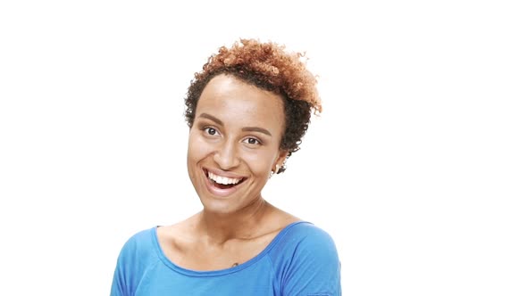 Young Beautiful African Girl Smiling Over White Background