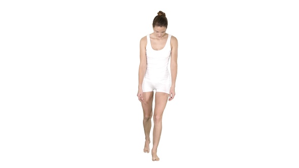 Slim Model Walking In White Lingerie on white background.
