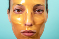 Beautiful woman using facial collagen gel skincare mask treatment - PhotoDune Item for Sale