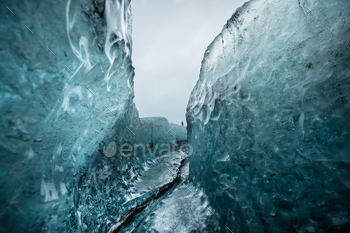 Inside a glacier ice cave in Iceland / Photodune, Misc