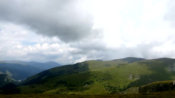 Dramatic clouds on mountains timelapse