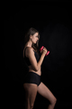 Portrait of young beautiful woman making physical exercises with dumbbells - PhotoDune Item for Sale