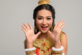 woman wearing Thai dress that made a hand symbol - PhotoDune Item for Sale