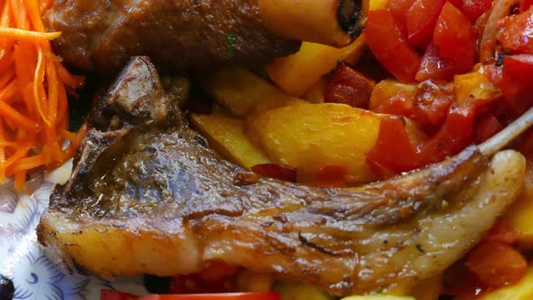 Bonein Beef Meat with Vegetables on a Plate